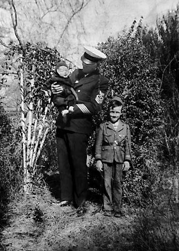 Retouched image of Grandad, Dad, and Aunt .  the image is much clearer, particularly in  the facial details  of  Dad and Aunt.